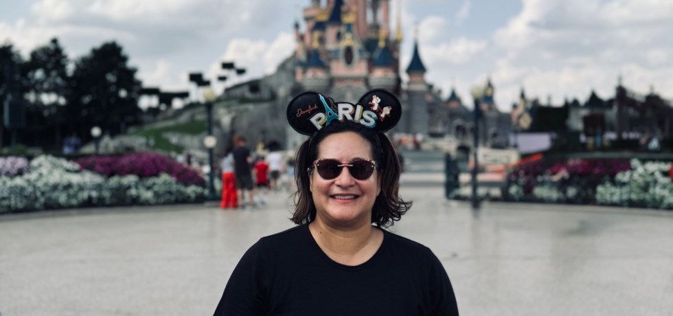 Marisa at Disneyland Paris in front of Bell's castle